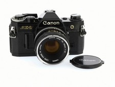 Canon AE-1 noir + objectif FD 50mm f/1.8 chrome nose