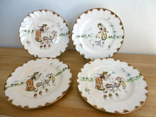 QUATRE ASSIETTES PLATES