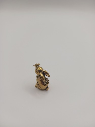 Petite figurine lapin fleuri