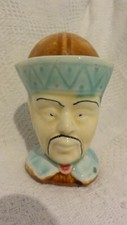 ANCIENNE TIRELIRE A CASSER CERAMIQUE BARBOTINE  TETE VISAGE CHINOIS ONNAING ???