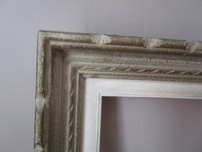 Cadre en bois sculpté