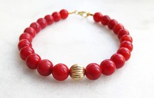 Bracelet homme 8 mm corail rouge or jaune 18 carats sur grosses perles griffe...