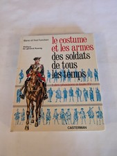 le costume et les armes des