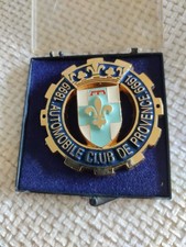 PLAQUE DE CALANDRE DE