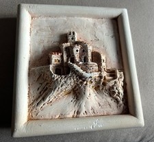 petit cadre en plâtre moulé