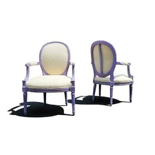 A pair of French Louis XVI 19th century cabriolet lounge chairs