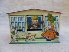 ANCIENNE TIRELIRE À SYSTÈME