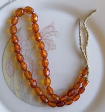 Perles en ambre facette ancien