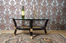 Table basse ovale design médusa bois massif doré feuille d'or d'un château à BX.