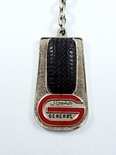 KEYCHAIN - GENERAL TIRES 1971 - metal 2D tire - Marrakech Morocco -