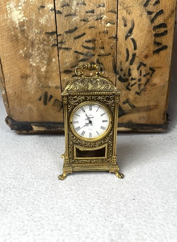 Horloge pendule bronze doré