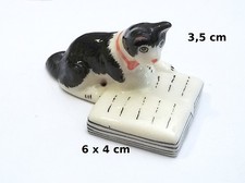 chat sur un livre,miniature de