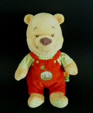 *. DOUDOU PELUCHE NICOTOY WINNIE JAUNE SALOPETTE ROUGE ARROSOIR RADIS 23c TBE