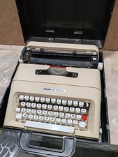 machine à écrire Vintage Olivetti Lettera 35 et sa malette Lire L'annonce 
