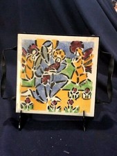 D'ARCY FRENCH 6 IN TILE TRIVET OF MADONNA AND CHILD WITH WROUGHT METAL HOLDER