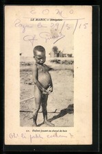Old postcard Morocco, Senegalese, child playing wooden horse, Afrikanische Volkstypen 