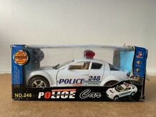 VOITURE DE POLICE CHIEF 248 1/24 EN BOITE T2