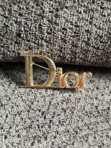 Broche vestiaire dior doré - broche,