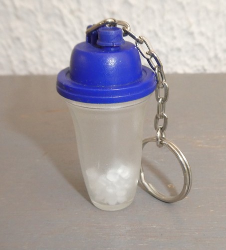 Porte clefs tupperware - porte,