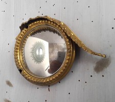 Mini œil de sorcière à ornement bronze.