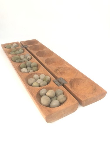 Ancien jeu awale africain en - d'awale,