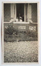 Family behind window open house - old photo snapshot