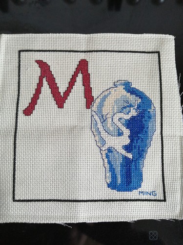 Broderie finie monogramme et - monogramme, m