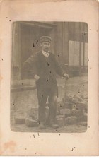 Photo Card - PARIS - Man near cobblestones in the middle of a street
