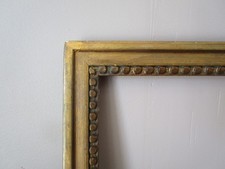 Cadre ancien en bois sculpté