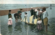 A sailboat - child, sea, sand