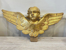 Grande tête d'ange ailé en