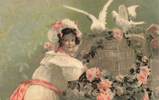 Fille pigeons blancs cage