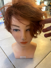 Tête à coiffer exercice