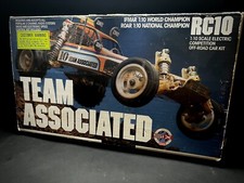 Vintage Team Associated Rc10 Buggy Gold with original box and instructions