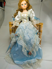 Poupée en porcelaine 60 cm