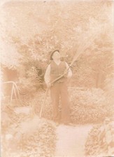 OLD PHOTOGRAPH PHOTO IN THE GARDEN MAN GARDEN HOSE
