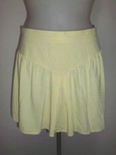 JUPE DE TENNIS ADIDAS COULEUR JAUNE FERME PAR TIRETTE SUR LE COTE TAILLE small