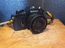 Nikon EM Noire  35mm +