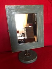 swivel mirror - on base - made in Philippines - height 25 cms - on wood