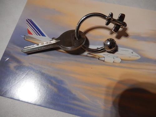 Porte clef air - , +