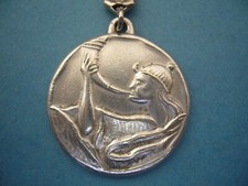 Keychain - Keychain - PLANTIN FERTILIZER - Roland Ronceveaux ringing horn?