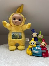 Télétubbies Peluche Lala et tirelire 1996