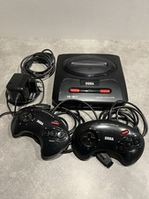 console megadrive 2  fonctionnelle avec les Câbles plus 6 jeux