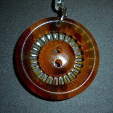 Superb Collectible BUTTON Keyring - Perforated Bike Wheel Style