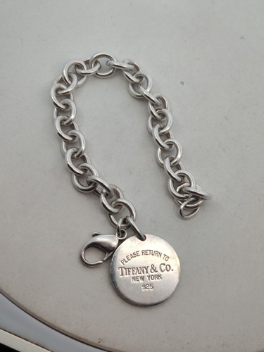 Please return tiffany co - &,