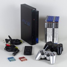 PlayStation 2 PS2 Sony + 2 Manettes + 7 Jeux + Télécommande + 2 Cartes PAL