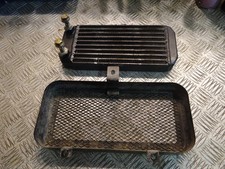 radiateur d'huile et grille de radiateur quad barossa 250 ou quad smc 250