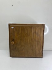 Wall cabinet key fob ? wooden in its juice to retape