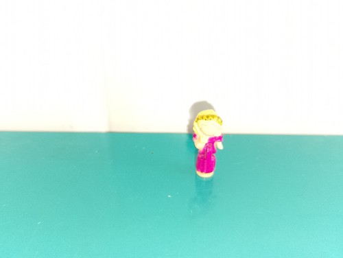 Polly pocket figurine doll