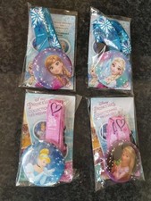 DISNEY PRINCESSES lot de 4 médailles Disney La Reine des Neige